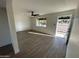 Bright living area boasts laminate floors and views of the entry at 7637 E Akron St, Mesa, AZ 85207