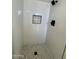 A sleek shower with neutral tile work and modern fixtures awaits you at 7637 E Akron St, Mesa, AZ 85207