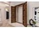 View of the hallway with decorative wooden piece open at 7678 E Cactus Wren Rd, Scottsdale, AZ 85250