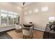 Well-lit office space with neutral walls, plantation shutters, and modern decor at 7678 E Cactus Wren Rd, Scottsdale, AZ 85250