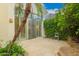 Enclosed patio area with tiled floors and shade cover perfect for outdoor enjoyment at 7678 E Cactus Wren Rd, Scottsdale, AZ 85250