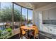 Bright dining area with desert views, modern lighting, and a breakfast nook at 7703 E Overlook Dr, Scottsdale, AZ 85255