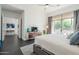 Open concept main bedroom with backyard access, hardwood floors, and a modern design at 7703 E Overlook Dr, Scottsdale, AZ 85255