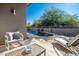 Inviting pool area with elegant patio furniture, perfect for relaxation and outdoor enjoyment at 7703 E Overlook Dr, Scottsdale, AZ 85255