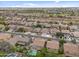 Neighborhood aerial view showcases homes with mature landscaping at 824 E Chelsea Dr, San Tan Valley, AZ 85140
