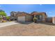 Charming single-Gathering home with a two-car garage and desert landscaping for easy maintenance at 10245 W Parkway Dr, Tolleson, AZ 85353