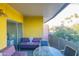 This covered balcony includes a sofa and seating area, perfect for outdoor relaxation at 1111 W University Dr # 2012, Tempe, AZ 85281