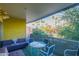 This spacious balcony features ample seating and a scenic view of the surrounding palm trees at 1111 W University Dr # 2012, Tempe, AZ 85281