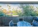 This balcony offers seating with a view of palm trees and the community at 1111 W University Dr # 2012, Tempe, AZ 85281