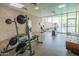 Well-equipped gym featuring modern exercise machines and free weights, overlooking the community pool at 1111 W University Dr # 2012, Tempe, AZ 85281