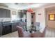 Charming eat-in kitchen with gray cabinets, stainless steel appliances, and a laundry room at 1111 W University Dr # 2012, Tempe, AZ 85281