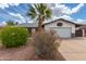 Charming home featuring a desert landscape and a well-maintained lawn at 1153 W Mesquite St, Chandler, AZ 85224