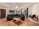Inviting living room featuring a corner fireplace and french doors at 1153 W Mesquite St, Chandler, AZ 85224