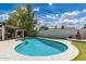 Sparkling backyard pool with a pristine patio area offers a refreshing outdoor oasis for relaxation and entertainment at 1153 W Mesquite St, Chandler, AZ 85224