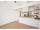 Spacious kitchen with modern appliances and a breakfast bar at 1200 W Boxelder Cir, Chandler, AZ 85224