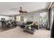 Open-concept living area seamlessly connecting the living room and kitchen, ideal for gatherings at 12057 W Ashby Dr, Peoria, AZ 85383