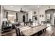 Open floor plan integrating the dining and living area, perfect for entertaining and everyday living at 12057 W Ashby Dr, Peoria, AZ 85383