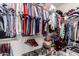 This walk-in closet is well organized with shelving and hanging storage to maximize space at 12057 W Ashby Dr, Peoria, AZ 85383