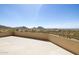 A spacious balcony showcases picturesque views of the surrounding mountains and valley at 12639 N 136Th St, Scottsdale, AZ 85259