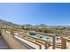 A balcony with views of the backyard pool, spa and picturesque mountain views at 12639 N 136Th St, Scottsdale, AZ 85259