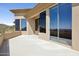A side angle view of a balcony, showing large picture windows that let in lots of light at 12639 N 136Th St, Scottsdale, AZ 85259