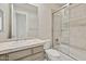Well-maintained bathroom with a shower-tub combo and neutral tile, offering a clean and functional space at 12639 N 136Th St, Scottsdale, AZ 85259