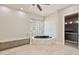 Bathroom featuring a standalone tub and walk-in closet at 12639 N 136Th St, Scottsdale, AZ 85259