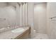 Bathroom features vanity with marble countertops and a decorative mirror with neutral-toned walls at 12639 N 136Th St, Scottsdale, AZ 85259