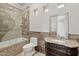 Bathroom featuring a shower, tub, and vanity with granite countertops and a decorative framed mirror at 12639 N 136Th St, Scottsdale, AZ 85259