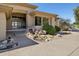 Inviting front entrance with a beautiful water feature and well-maintained landscaping at 12639 N 136Th St, Scottsdale, AZ 85259