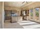 Well-equipped kitchen with a large island, stainless steel appliances, custom cabinets and scenic views at 12639 N 136Th St, Scottsdale, AZ 85259
