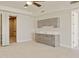 Stylish entertainment area with a wet bar and modern cabinetry, perfect for hosting guests and relaxation at 12639 N 136Th St, Scottsdale, AZ 85259