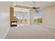 Spacious living room featuring fireplace, large windows with natural light and mountain views at 12639 N 136Th St, Scottsdale, AZ 85259