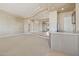 Open-concept living room with curved ceiling accents, modern bar and easy access to other rooms at 12639 N 136Th St, Scottsdale, AZ 85259