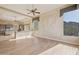 Bright, open living room with hardwood floors, and panoramic mountain views through large windows at 12639 N 136Th St, Scottsdale, AZ 85259