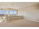 Bright living space boasts stunning views from large windows and tray ceilings at 12639 N 136Th St, Scottsdale, AZ 85259