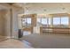 Open living area with chandelier, natural light, and stunning mountain views at 12639 N 136Th St, Scottsdale, AZ 85259