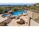 Luxury pool area with waterfall features, outdoor kitchen, and desert landscape views at 12639 N 136Th St, Scottsdale, AZ 85259