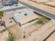 Property view of a well-maintained home with covered patio, privacy fencing, and low-maintenance landscaping at 1297 E Avenida Kino --, Casa Grande, AZ 85122