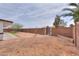 Expansive backyard space featuring brick fence and minimal landscaping at 1297 E Avenida Kino --, Casa Grande, AZ 85122