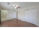 Spacious bedroom with wood floors and closet space; attached bathroom at 1297 E Avenida Kino --, Casa Grande, AZ 85122