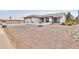Charming single-story home featuring low-maintenance yard and a well-kept exterior at 1297 E Avenida Kino --, Casa Grande, AZ 85122