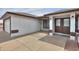 Inviting front entrance with well-maintained walkway, double-door entryway, and attached garage at 1297 E Avenida Kino --, Casa Grande, AZ 85122