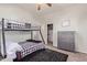 ' bedroom featuring bunk beds, dark wood furniture and carpet at 14022 W Hope Dr, Surprise, AZ 85379