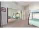Bedroom with bunk beds, mirrored closet doors, and neutral colored walls at 14022 W Hope Dr, Surprise, AZ 85379