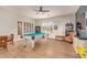Spacious game room featuring a pool table, seating, and wood flooring at 14022 W Hope Dr, Surprise, AZ 85379
