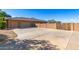 Spacious three-car garage and expansive parking area at 14022 W Hope Dr, Surprise, AZ 85379