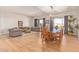 Bright living area seamlessly connects to the dining space, offering modern comfort and style at 14022 W Hope Dr, Surprise, AZ 85379