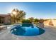 Sparkling pool area with well-maintained landscaping, lounge chairs, and sunlit patio, perfect for relaxation at 14022 W Hope Dr, Surprise, AZ 85379
