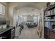 Spacious bedroom with lots of natural light and an archway at 14874 W Laurel Ln, Surprise, AZ 85379